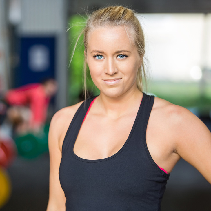 Joanna Gill in the gym with her workout clothes on.